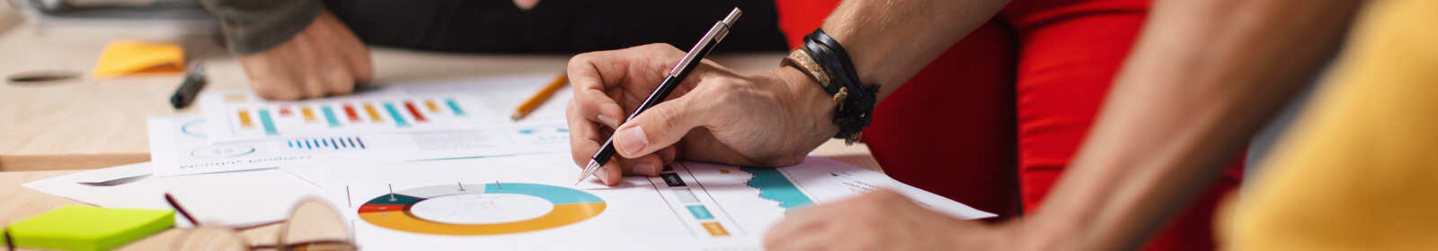 employees reviewing financial documents