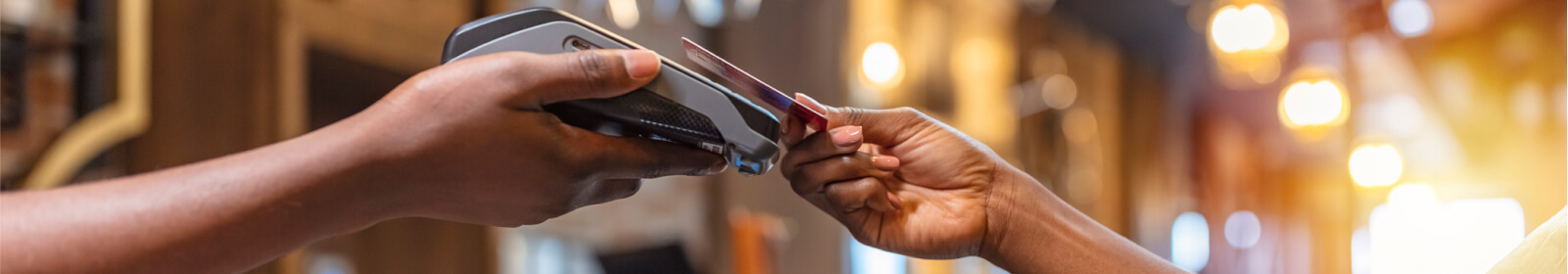 a person paying with a credit/debit card