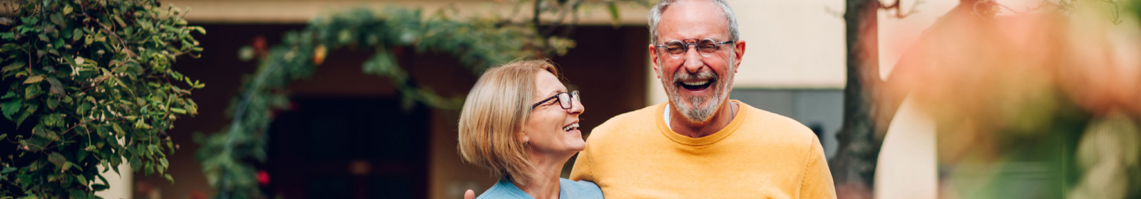 middle age couple walking outside